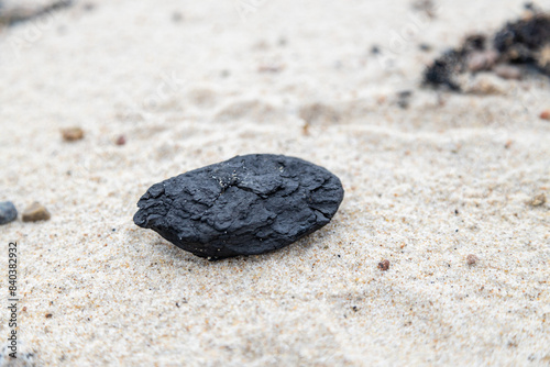 Fototapeta Naklejka Na Ścianę i Meble -  Natural coal pieces in a Bornholm beach - coal geology