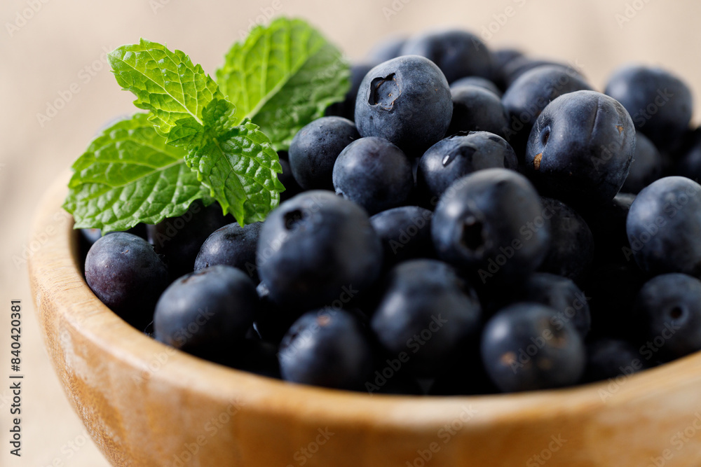 Ripe organic blueberries on wooden table background. Selective focus. Ripe organic blueberries on wooden table background. Selective focus.