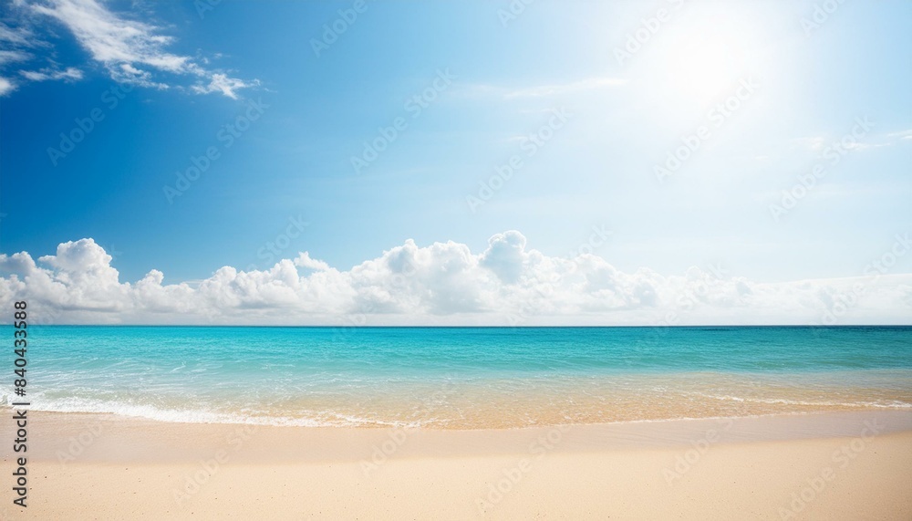 快晴のビーチ　真夏の強い太陽光　青い海と空の背景