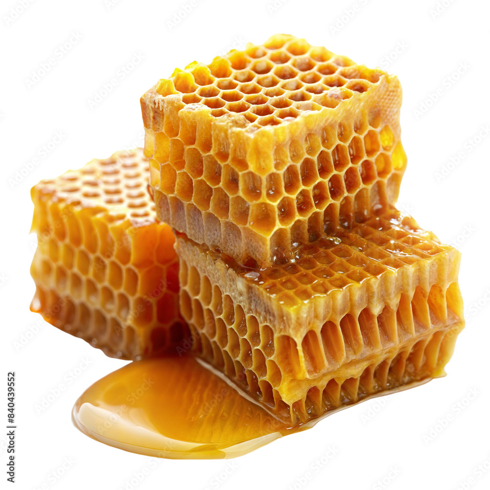 Fresh honeycomb pieces with dripping honey close-up