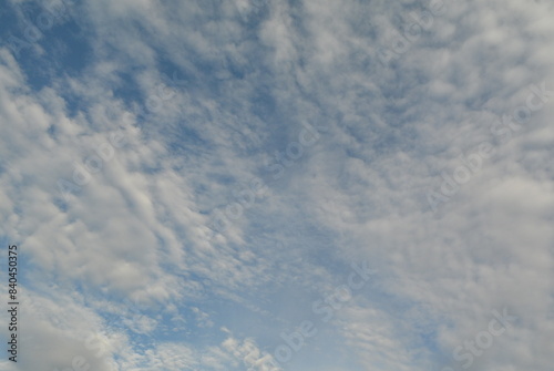 Cirrus and cumulus clouds against a blue sky