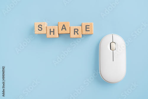 Canvas Print share word  on wooden cube blocks and computer wireless mouse User generated content, UGC, Online marketing concept