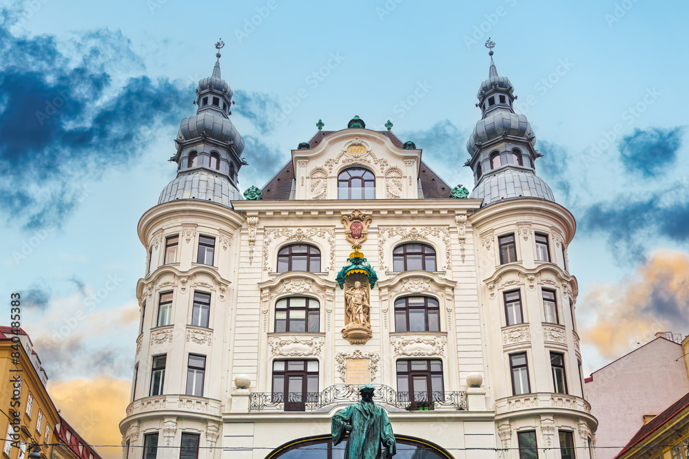 1897 Regensburger Hof building at Lugeck square with a statue of Johannes Gutenberg, Vienna, Austria 1897 Regensburger Hof building at Lugeck square with a statue of Johannes Gutenberg, Vienna, Austria