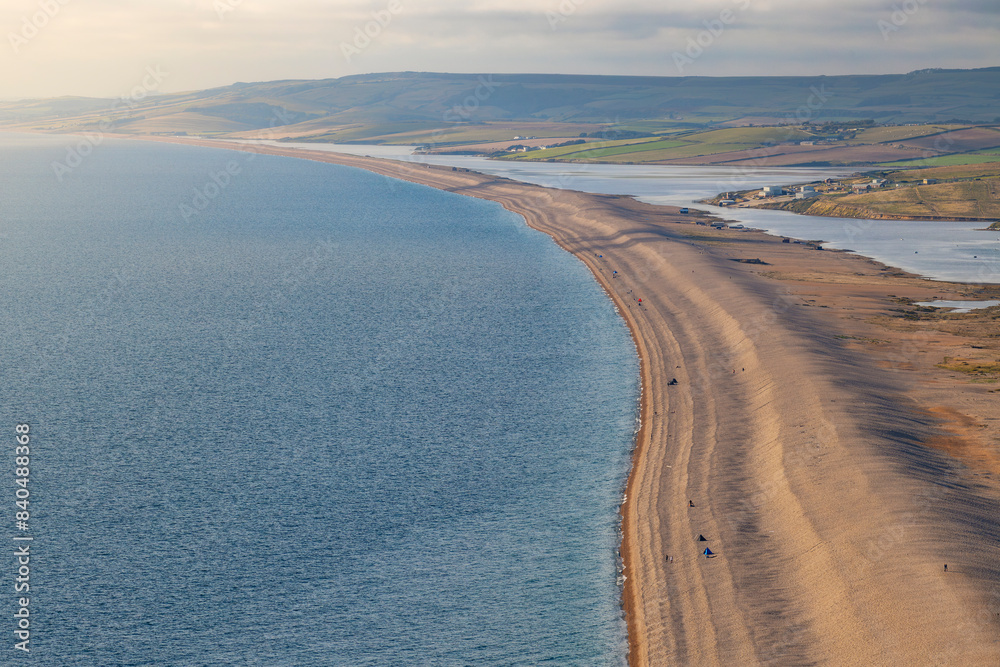 Elevated view of Chesil Beach at sunset, Jurassic Coast, UNESCO World Heritage Site, Dorset, England, United Kingdom Elevated view of Chesil Beach at sunset, Jurassic Coast, UNESCO World Heritage Site, Dorset, England, United Kingdom