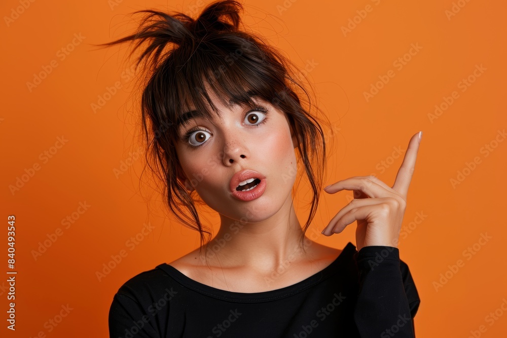 an attractive tech influencer, white American 20 years old, brown eyes, she looks as if she does not understand a question, fun confused expression, she's wearing black t-shirt, orange background an attractive tech influencer, white American 20 years old, brown eyes, she looks as if she does not understand a question, fun confused expression, she's wearing black t-shirt, orange background