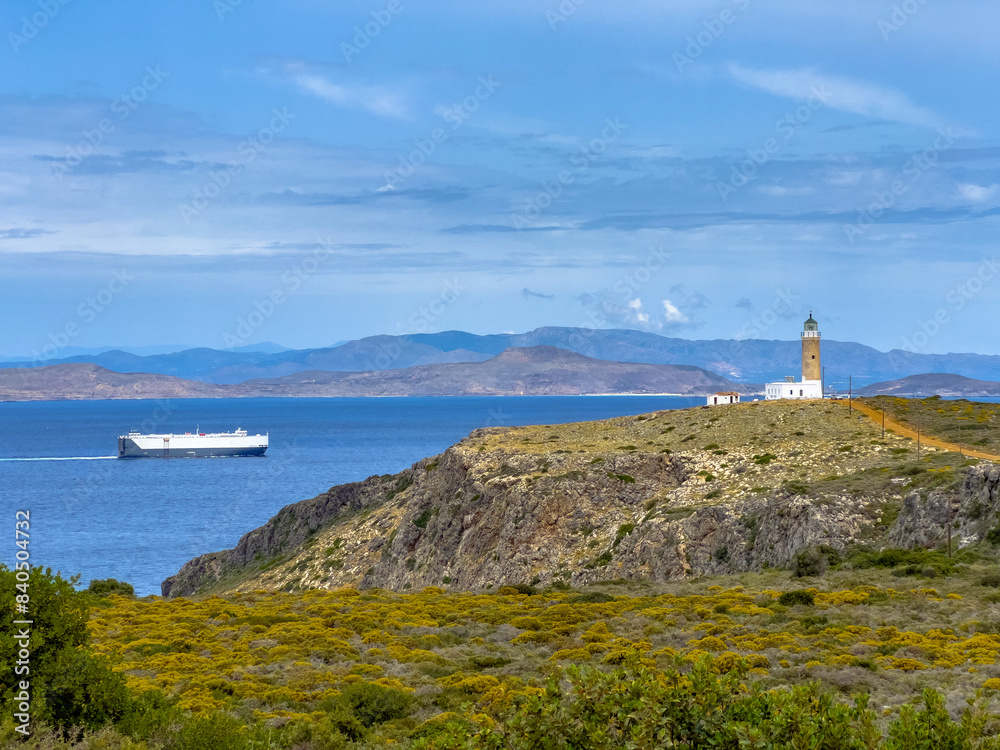 Amazing lighthouse of Moudari with ruins of flag signs building on Kythira island, Greece.