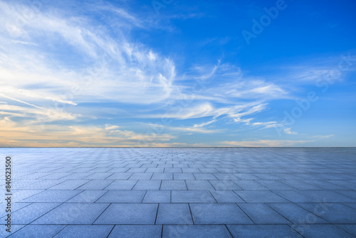 Empty square floor with sky clouds background © ABCDstock