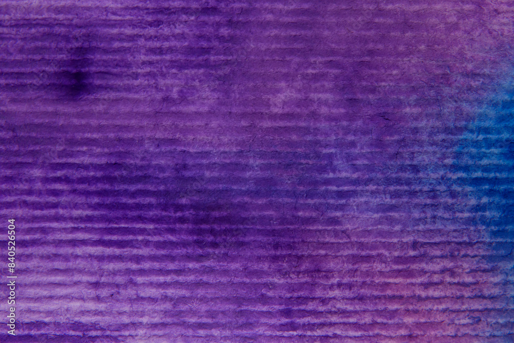 Fototapeta premium close up of striped paper painted with violet and blue colors
