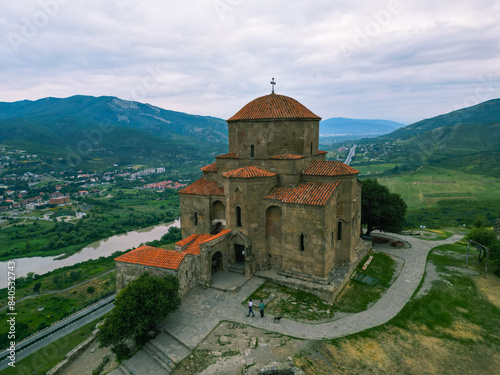 ancient Christian monastery in the mountains - aerial drone photo