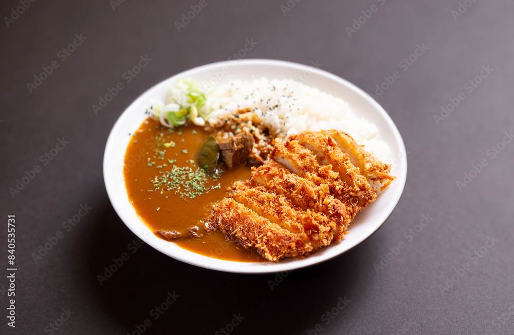 Pork cutlet with delicious Curry sauce on a plate 