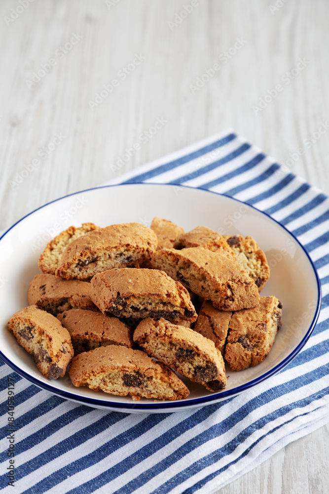Chocolate Cantuccini on a Plate, side view. Copy space. Chocolate Cantuccini on a Plate, side view. Copy space.
