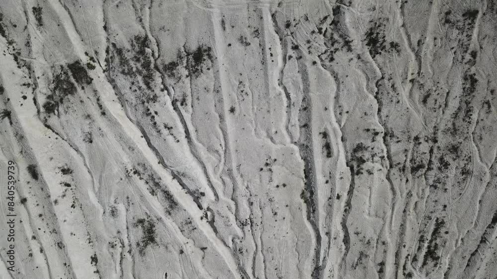 Aerial view white sand field. Natural abstract textured background. Drone footage. Aerial view white sand field. Natural abstract textured background. Drone footage.