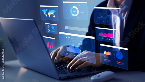 Businessman using KPI dashboard. Management data System KPI connected in database for follow earnings,operations and sales data. Financial business data analytics graph dashboard.