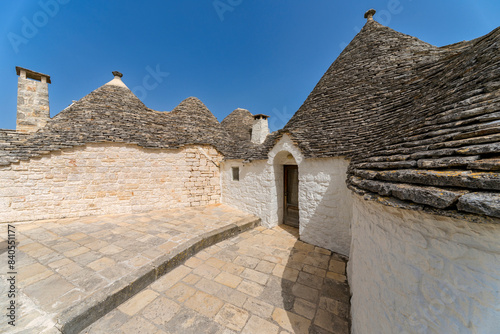 Fototapeta Naklejka Na Ścianę i Meble -  street in the old town, Alberobello, Apulia, Italy, Europe, March 2024