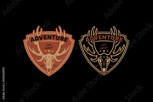 deer skull head with shield logo design for wildlife hunting and adventure sport business