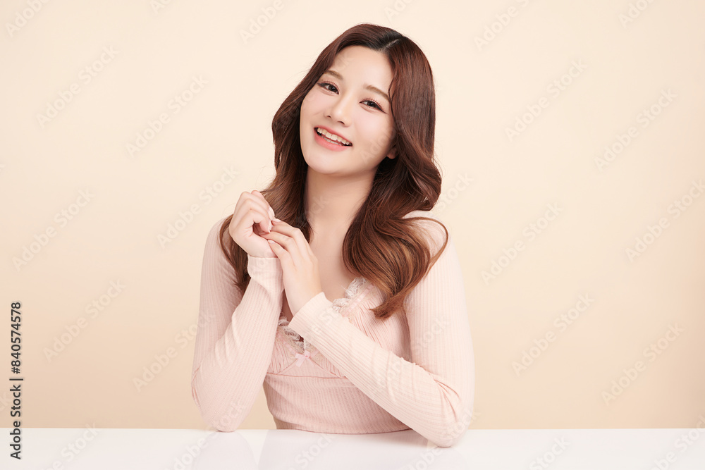 Beautiful young asian woman with clean fresh skin on beige background, Face care, Facial treatment, Cosmetology, beauty and spa, Asian women portrait. Beautiful young asian woman with clean fresh skin on beige background, Face care, Facial treatment, Cosmetology, beauty and spa, Asian women portrait.