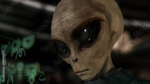 Alien looking at an interface