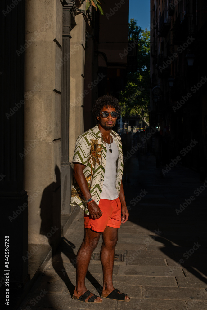 Brazilian Male Model Posing in Urban Setting with Colorful Summer Attire: High-End Fashion Cinematic Lighting Brazilian Male Model Posing in Urban Setting with Colorful Summer Attire: High-End Fashion Cinematic Lighting