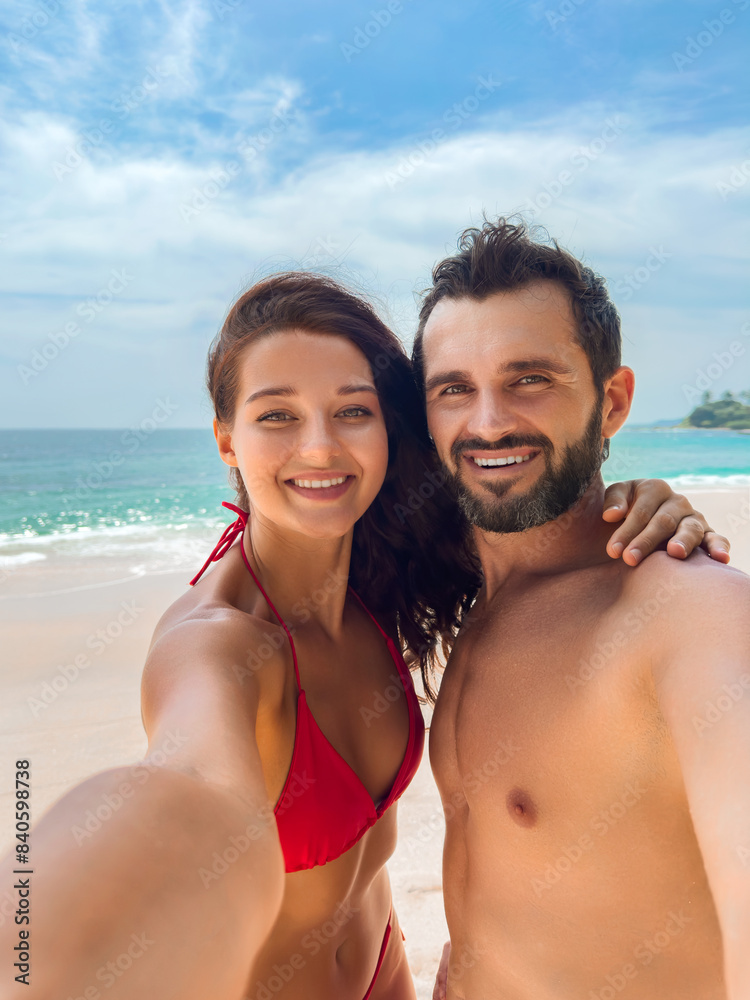 Happy Couple Taking a Selfie on a Sunny Beach Vacation Happy Couple Taking a Selfie on a Sunny Beach Vacation