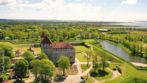 4K panoramic aerial video from flying drone to Kuressaare (Arensburg)  Episcopal Castle a sunny summer day.Kuressaare in the Baltic sea,Saaremaa island, Saare County, Estonia. photo