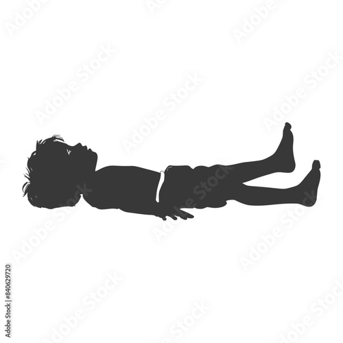 Silhouette of a boy lying down, shorts, relaxed, child flat on back, carefree pose.