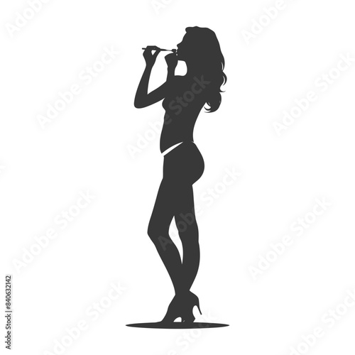Silhouette: Woman in Heels Applying Makeup