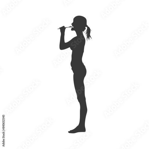Silhouette of a woman brushing her teeth, morning hygiene routine.
