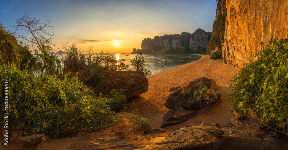 sunset at tonsai beach on tropical island railay in krabi in thailand