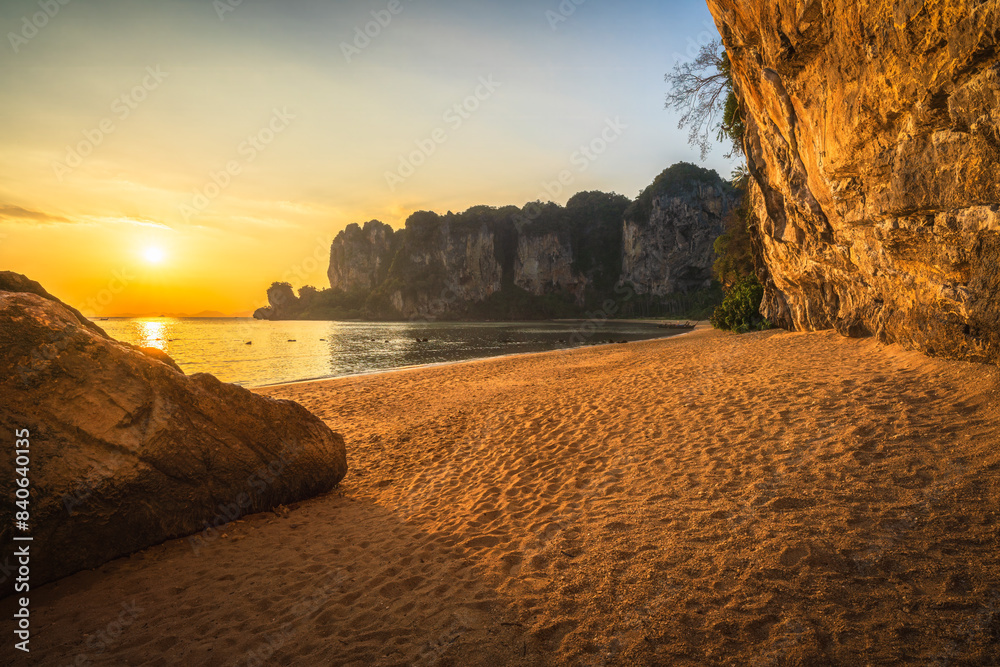 sunset at tonsai beach on tropical island railay in krabi in thailand
