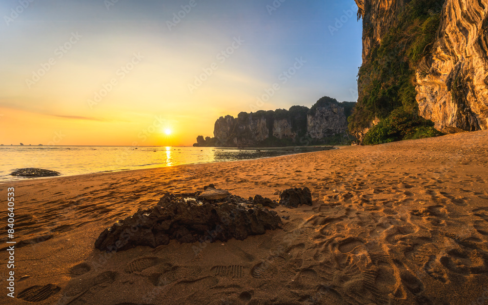 sunset at tonsai beach on tropical island railay in krabi in thailand