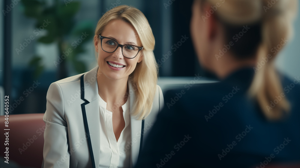 happy business woman smiling during a job interview happy business woman smiling during a job interview