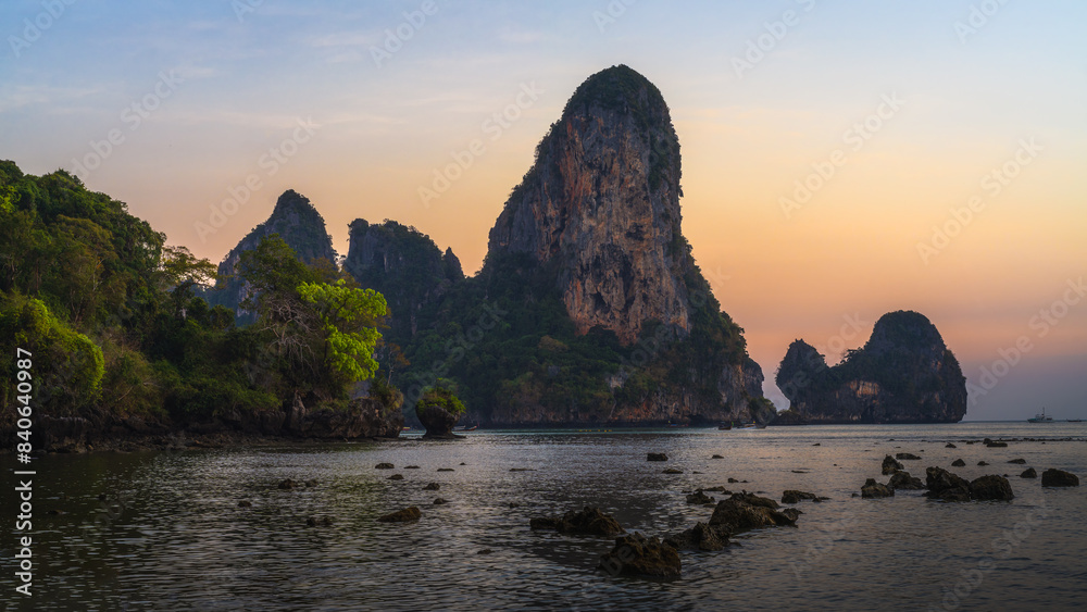 sunset at tonsai beach on tropical island railay in krabi in thailand
