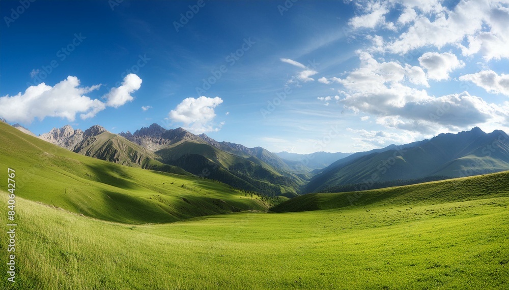 A picturesque valley background with a wide area for text, highlighting mountains, a blue sky, and a sweeping expanse of grass. A picturesque valley background with a wide area for text, highlighting mountains, a blue sky, and a sweeping expanse of grass.