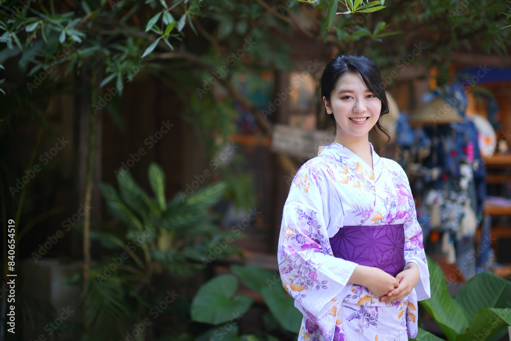 Portrait of beautiful young Japanese girl in Japanese kimono Portrait of beautiful young Japanese girl in Japanese kimono
