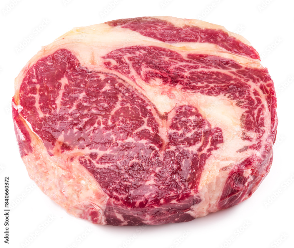Obraz premium Raw ribeye steak isolated on white background.