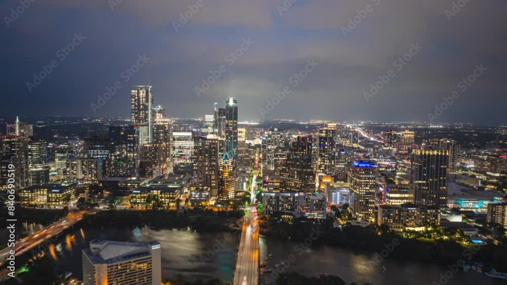 Vibrant hyperlapse of Austin, Texas at dusk, capturing city lights, modern skyscrapers, Colorado River and busy traffic on main roads as night sets in Vibrant hyperlapse of Austin, Texas at dusk, capturing city lights, modern skyscrapers, Colorado River and busy traffic on main roads as night sets in