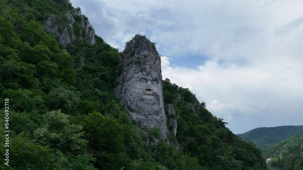 The rock sculpture of Decebalus, a colossal carving of the face of Decebalus, the last king of Dacia.
Decebalus Rex, Dragan Facit The rock sculpture of Decebalus, a colossal carving of the face of Decebalus, the last king of Dacia.
Decebalus Rex, Dragan Facit