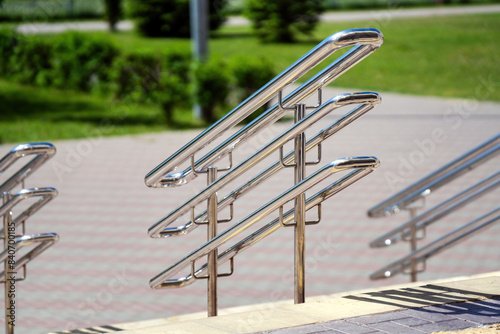 Multi-level metal railings catering to children and adults of various heights