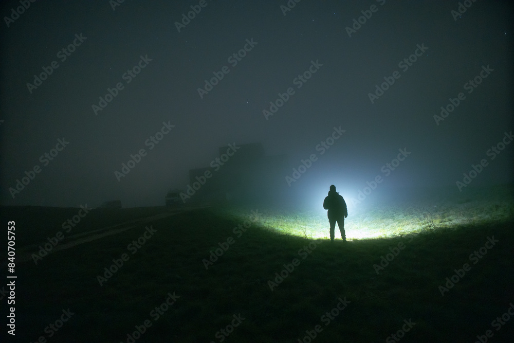 silhouette of a person in a fog field silhouette of a person in a fog field