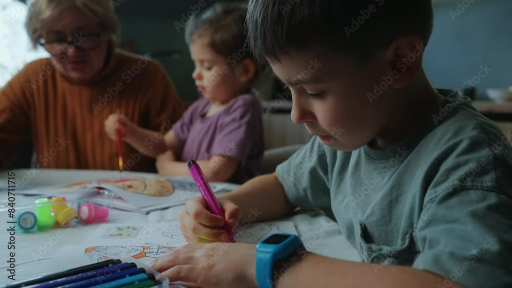 Kids and woman making colorful art. Having fun with family Kids and woman making colorful art. Having fun with family