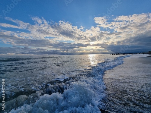 Mediterranean sea, sunset on the Turkiye blue sky with clouds on it, coastline, waves on the sea, coastline