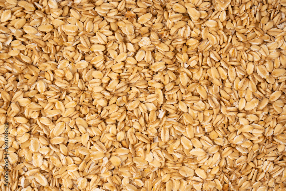 Oat-flakes as a background. Top view. Oat-flakes as a background. Top view.