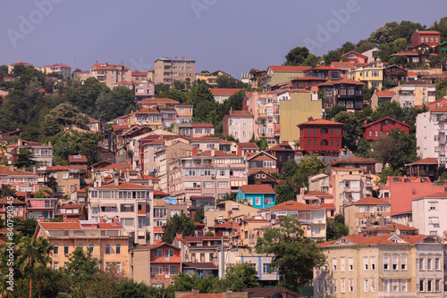 Southern cityscape, view of buildings and houses with green plants in public places in Turkey, sunny summer day in the city of Istanbul