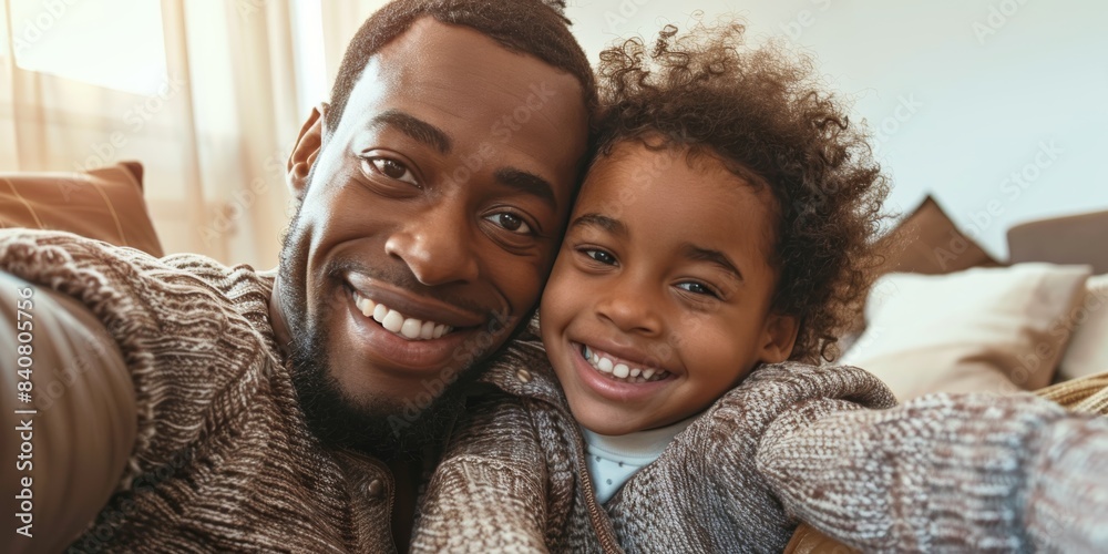Happy African couple, selfie on sofa, hug, grin, and blog post, home love and bonding. Black man, lady, and memories with social media profile image or romance on house. Happy African couple, selfie on sofa, hug, grin, and blog post, home love and bonding. Black man, lady, and memories with social media profile image or romance on house.