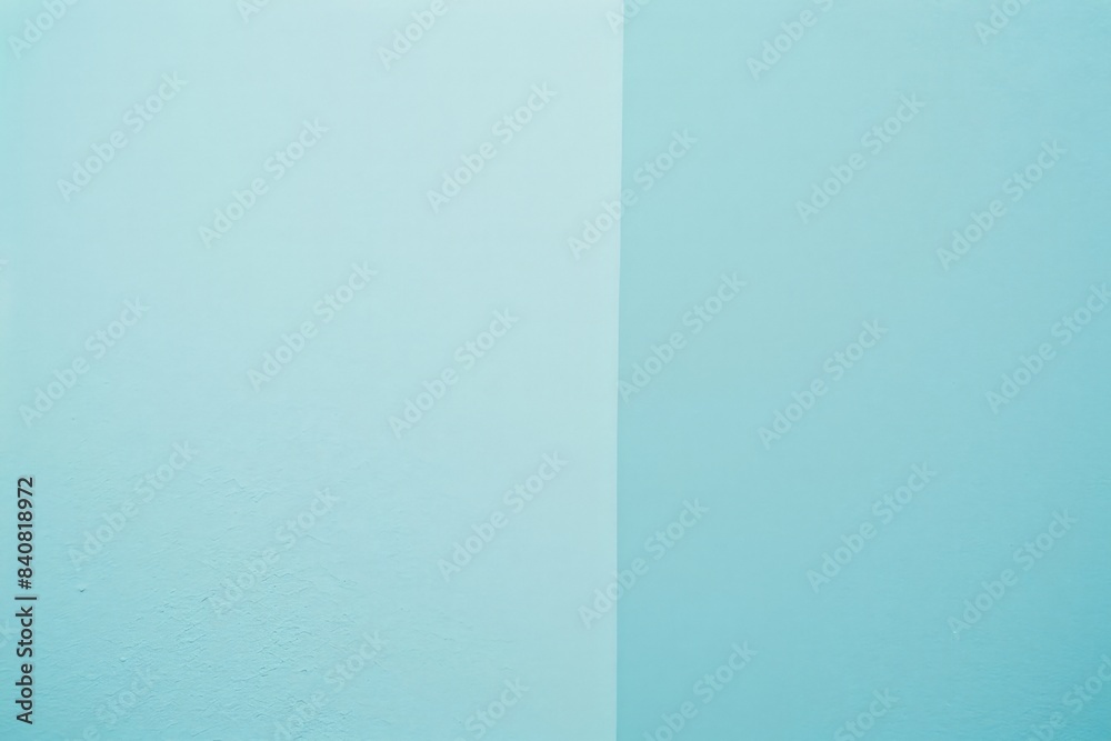 Simple background of a freshly painted light blue wall is divided by a vertical line, creating two distinct sections. The smooth surface and soft hue offer a clean and minimalist aesthetic Simple background of a freshly painted light blue wall is divided by a vertical line, creating two distinct sections. The smooth surface and soft hue offer a clean and minimalist aesthetic