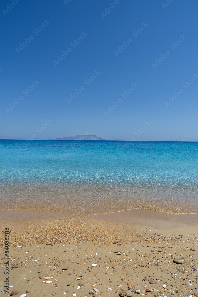 View of the amazing sandy and turquoise beach of Agia Theodoti in Ios Greece View of the amazing sandy and turquoise beach of Agia Theodoti in Ios Greece
