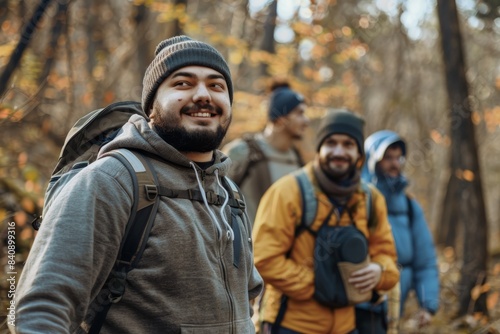 Adventurous Smiles Among Autumnal Foliage  A Group of Hikers Embraces The Wilderness