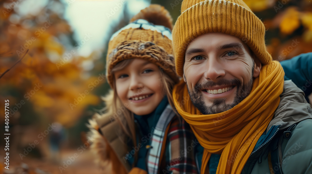 Happy father and daughter in the forest during autumn season Happy father and daughter in the forest during autumn season