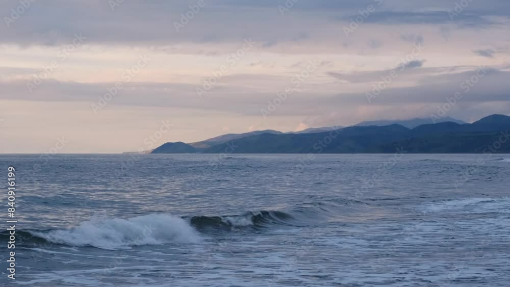 Seascape at sunset with views of the mountains and sea. Seascape at sunset with views of the mountains and sea.