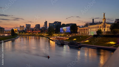 Obraz na płótnie Vilnius night sunset panoramic cityscape with Neris river, church and skyscrapers of New Center. Lithuania, Baltic states. w salonie